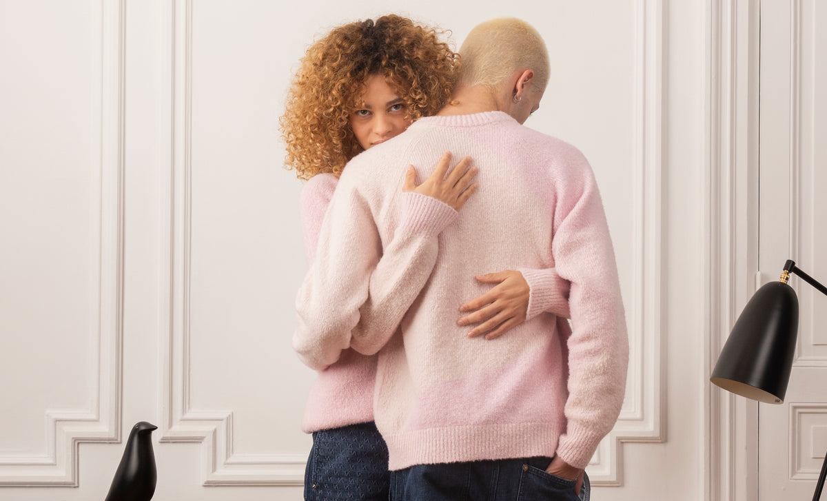 Man and woman with a pink sweat